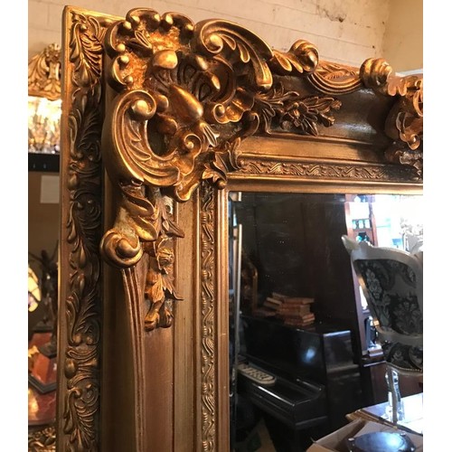 784 - Rectangular Form Gilded Wall Mirror with Swept Corner Detailing Approximately 6ft 4 Inches High x 2f... 