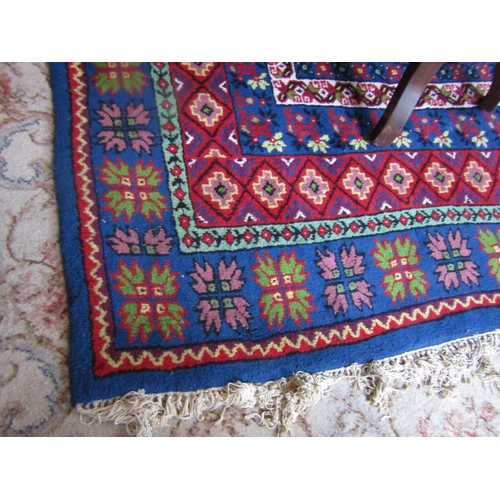 66 - Persian Pure Wool Rug Burgundy and Navy Ground Approximately 10ft Wide x 14ft Long