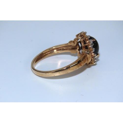 36 - Cabochon Cut Oval Centre Stone Ring with Diamond Surrounds Mounted on 9 Carat Yellow Gold Band Ring ... 