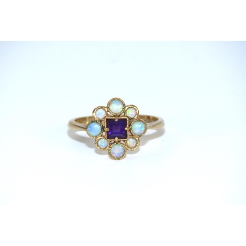 40 - Opal and Amethyst Set Ladies Ring Mounted on 9 Carat Gold Band Ring Size N and a Half