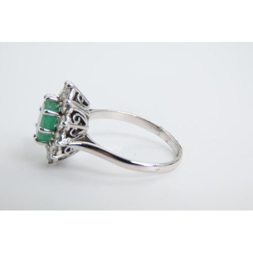 105 - Emerald and Diamond Ladies Cluster Ring Mounted on 18 Carat White Gold Band Ring Size Q