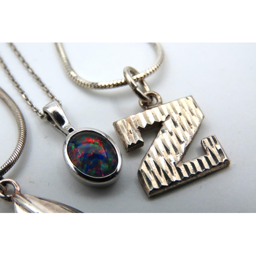 617 - Four Silver Ladies Pendant Necklaces Mounted on Silver Chains