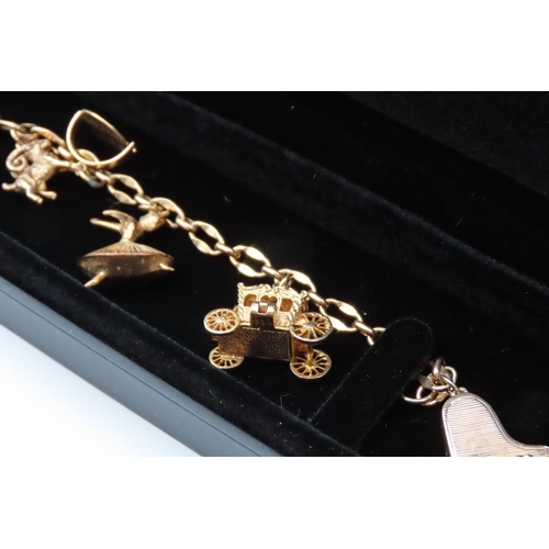 76 - 9 Carat Yellow Gold Ladies Charm Bracelet of Good Weight