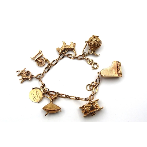 76 - 9 Carat Yellow Gold Ladies Charm Bracelet of Good Weight