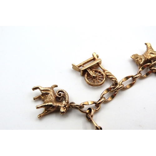 76 - 9 Carat Yellow Gold Ladies Charm Bracelet of Good Weight