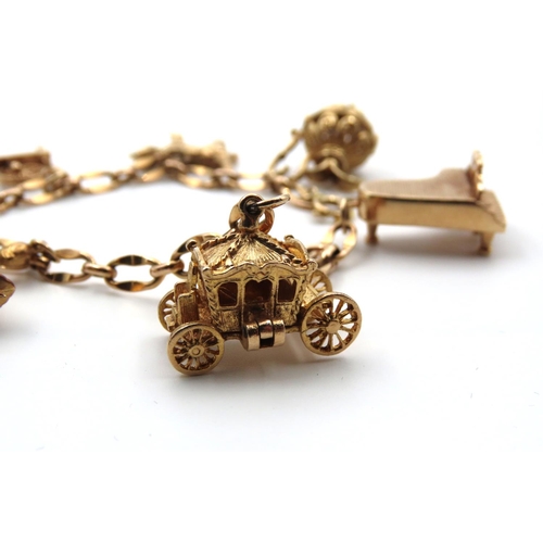 76 - 9 Carat Yellow Gold Ladies Charm Bracelet of Good Weight