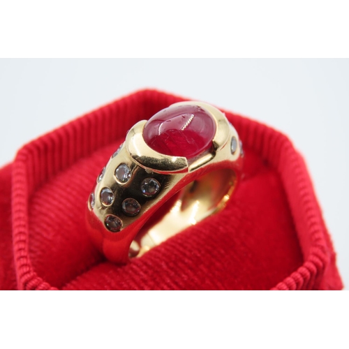 83 - Oval Ruby Centre Stone Ring Mounted on 18 Carat Yellow Gold Band with Further Diamond Decorated Shou... 