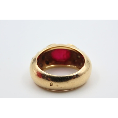 83 - Oval Ruby Centre Stone Ring Mounted on 18 Carat Yellow Gold Band with Further Diamond Decorated Shou... 