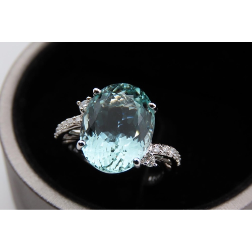 88 - 18 Carat White Gold Mounted Aquamarine Ladies Oval Cut Centre Stone Ring with Further Diamond Decora... 