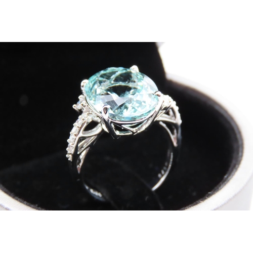 88 - 18 Carat White Gold Mounted Aquamarine Ladies Oval Cut Centre Stone Ring with Further Diamond Decora... 