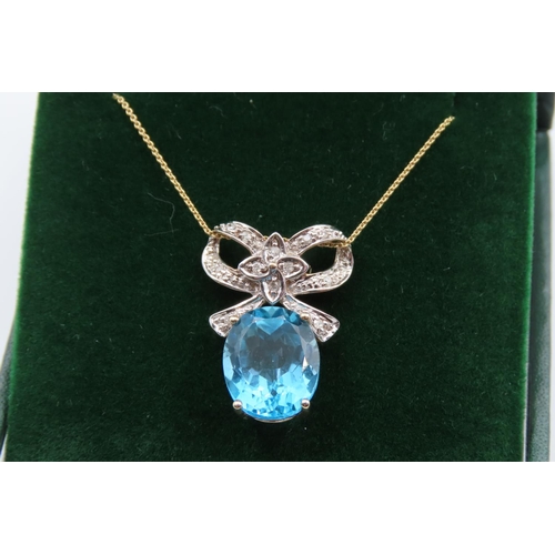 93 - 9 Carat Gold Set Blue Topaz and Diamond Ribbon Motif Pendant Necklace Mounted on 9 Carat Yellow Gold... 