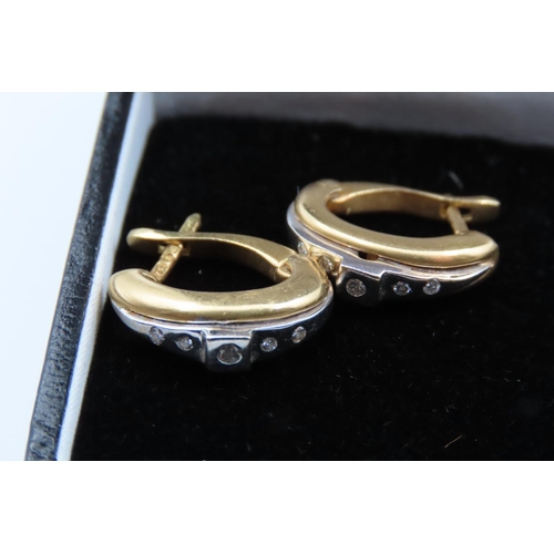 96 - Pair of 18 Carat Yellow and White Gold Earrings Inset with Diamonds