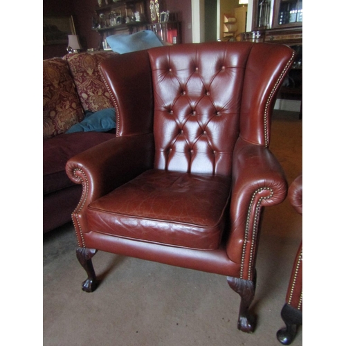 43 - Two Tan Leather Deep Button Upholstered Wingback Armchairs Well Carved Supports