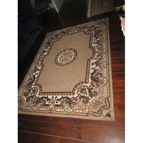 651 - Beige Wool Rug Patterned Borders Approximately 7ft Long x 5ft Wide