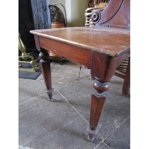 74 - Pair of Regency Hall Chairs Mahogany Well Carved Backs above Turned Supports