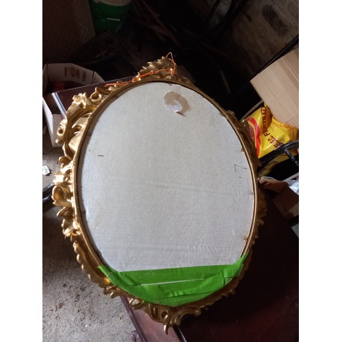 961 - Oval Gilded Mirror with Cherub Motifs Approximately 22 Inches High