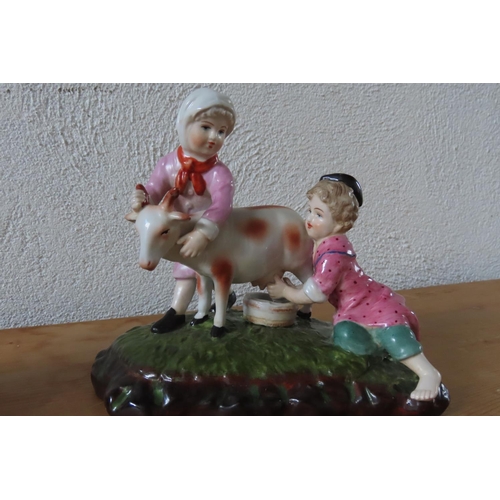 102 - Pair of Continental Porcelain Figures of Children with Goats and Cow Each Approximately 7 Inches Wid... 