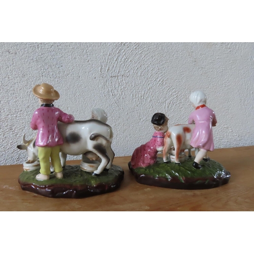 102 - Pair of Continental Porcelain Figures of Children with Goats and Cow Each Approximately 7 Inches Wid... 