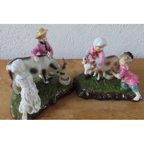 102 - Pair of Continental Porcelain Figures of Children with Goats and Cow Each Approximately 7 Inches Wid... 