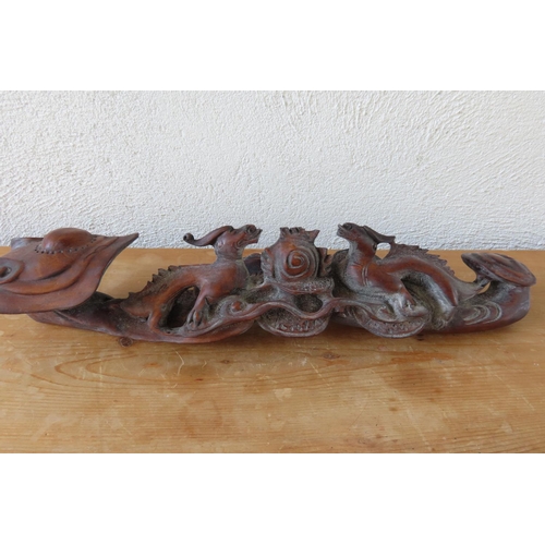 165 - Carved Hardwood Scroll Rest with Mythical Beast Carved Decoration Approximately 14 Inches Wide