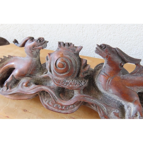 165 - Carved Hardwood Scroll Rest with Mythical Beast Carved Decoration Approximately 14 Inches Wide