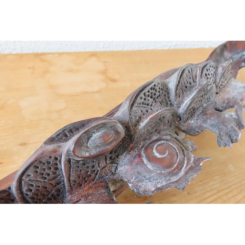 165 - Carved Hardwood Scroll Rest with Mythical Beast Carved Decoration Approximately 14 Inches Wide