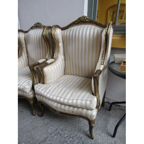 19 - Pair of Carved Giltwood Wingback Drawing Room Armchairs Cabriole Supports Generous Form