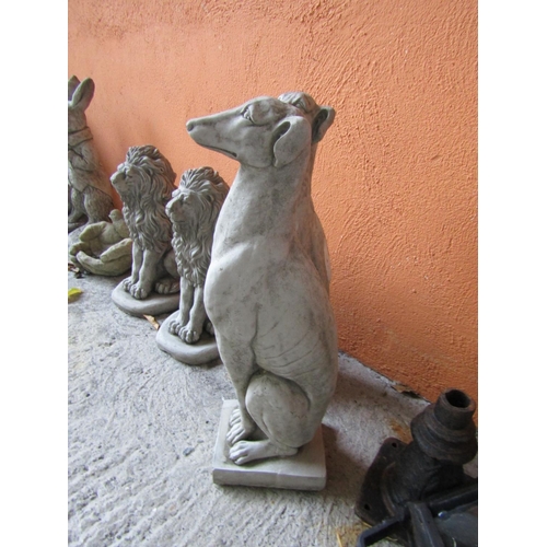 25 - Pair of Seated Hounds Each Approximately 18 Inches High Composite Stone