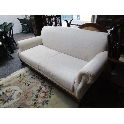 91 - Cream Fabric Upholstered Settee Roll Arm Ends above Carved Supports Approximately 7ft Wide