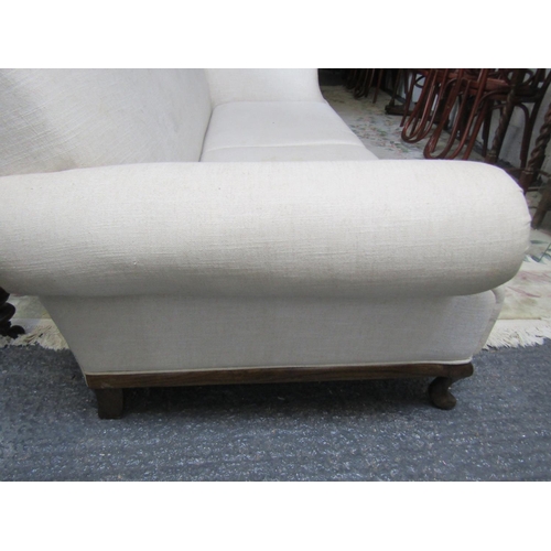 91 - Cream Fabric Upholstered Settee Roll Arm Ends above Carved Supports Approximately 7ft Wide