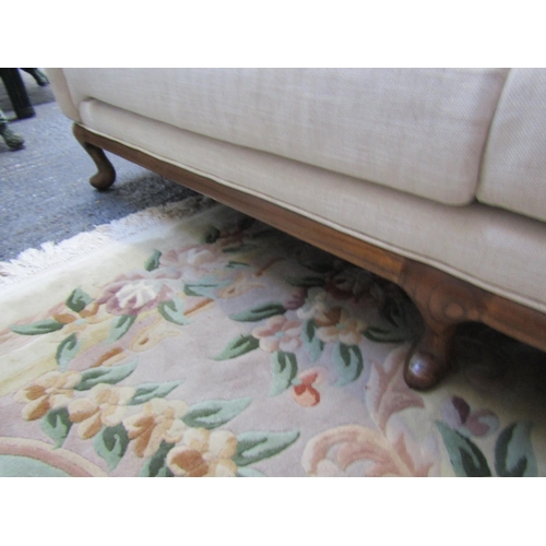 91 - Cream Fabric Upholstered Settee Roll Arm Ends above Carved Supports Approximately 7ft Wide