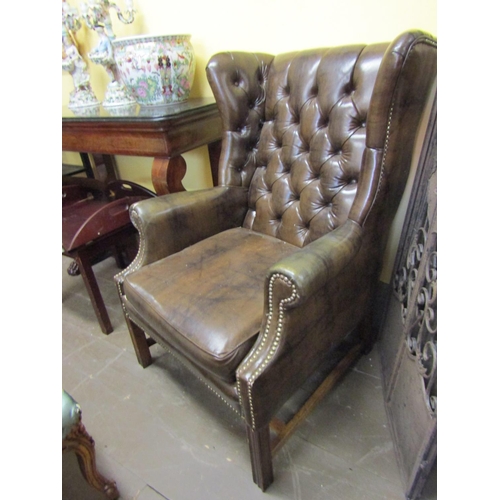 96 - Tan Leather Chesterfield Wingback Armchair Mahogany Chamfered Supports H Cross Stretcher Below Gener... 