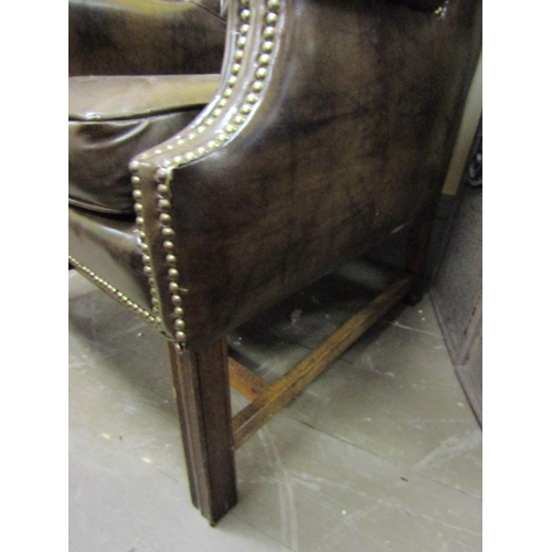 96 - Tan Leather Chesterfield Wingback Armchair Mahogany Chamfered Supports H Cross Stretcher Below Gener... 