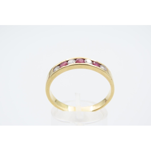 116 - Ruby and Diamond Half Hoop Ring Three Channel Set Circular Cut Rubies Interspaced with Four Diamonds... 