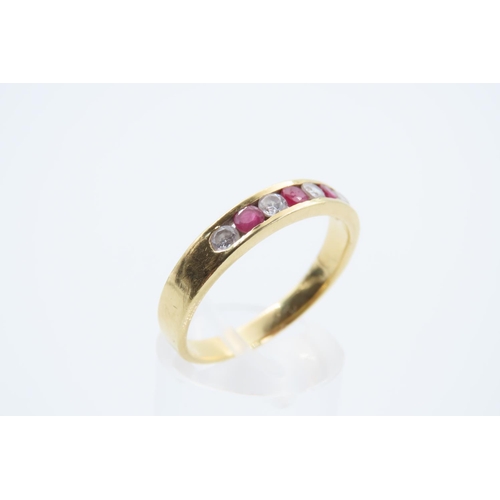 116 - Ruby and Diamond Half Hoop Ring Three Channel Set Circular Cut Rubies Interspaced with Four Diamonds... 