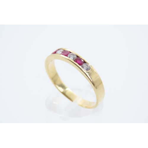 116 - Ruby and Diamond Half Hoop Ring Three Channel Set Circular Cut Rubies Interspaced with Four Diamonds... 