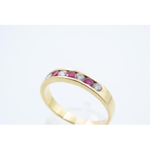 116 - Ruby and Diamond Half Hoop Ring Three Channel Set Circular Cut Rubies Interspaced with Four Diamonds... 