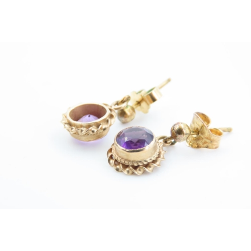 121 - Pair of 9 Carat Gold Amethyst Set Ladies Earrings