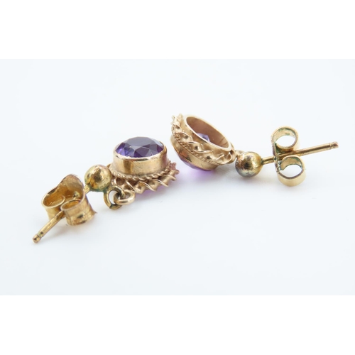 121 - Pair of 9 Carat Gold Amethyst Set Ladies Earrings