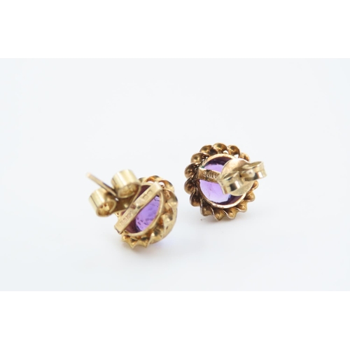 122 - Pair of Cushion Cut Amethyst Ladies Earrings Mounted on 9 Carat Yellow Gold