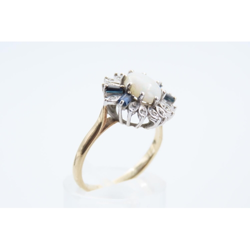 123 - Opal Cluster Ring Mounted on 9 Carat Gold Band Central Cabochon Cut Opal Flanked with Baguette Cut B... 