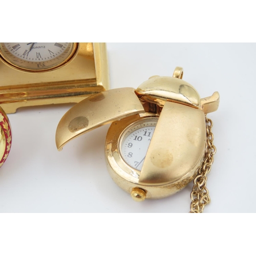 137 - Two Ladies Pendant Watches on Chains Gold Filled Ladybird and Globe Examples Brass Mounted Novelty F... 