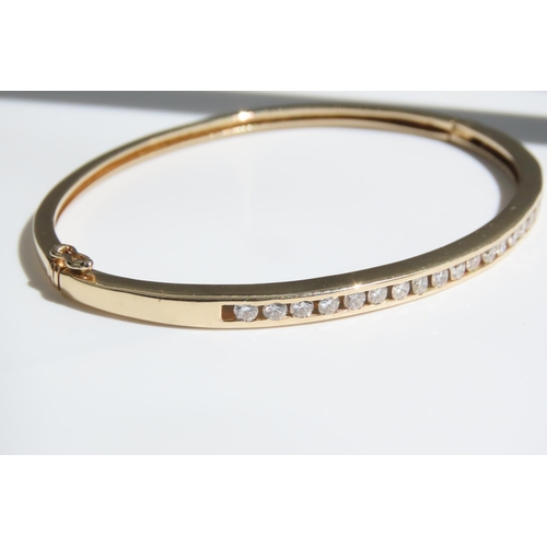 165 - Diamond Inset 14 Carat Yellow Gold Bangle Attractively Detailed Good Scintillation