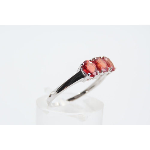 183 - Red Garnet Three Stone Ring Mounted on 9 Carat White Gold Band