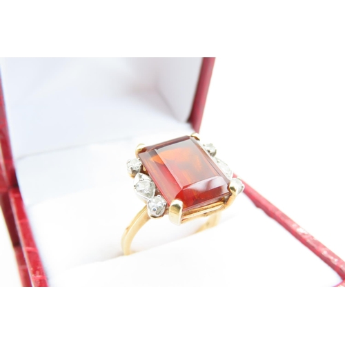 186 - Cognac Citrine Emerald Cut Ladies Ring with Diamond Decoration Mounted on 18 Carat Gold Attractively... 