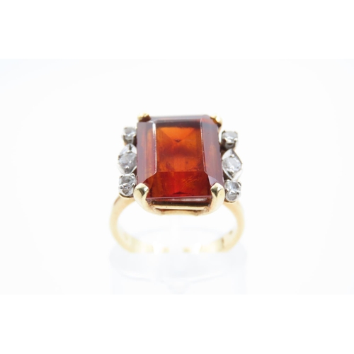 186 - Cognac Citrine Emerald Cut Ladies Ring with Diamond Decoration Mounted on 18 Carat Gold Attractively... 