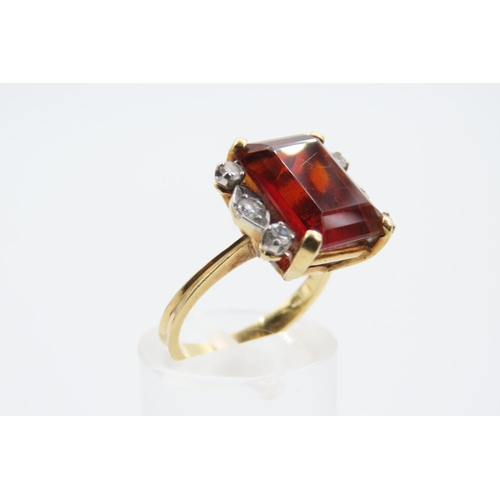 186 - Cognac Citrine Emerald Cut Ladies Ring with Diamond Decoration Mounted on 18 Carat Gold Attractively... 