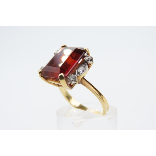 186 - Cognac Citrine Emerald Cut Ladies Ring with Diamond Decoration Mounted on 18 Carat Gold Attractively... 