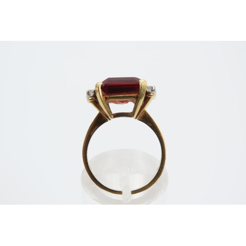 186 - Cognac Citrine Emerald Cut Ladies Ring with Diamond Decoration Mounted on 18 Carat Gold Attractively... 