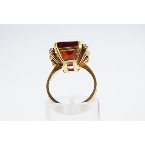 186 - Cognac Citrine Emerald Cut Ladies Ring with Diamond Decoration Mounted on 18 Carat Gold Attractively... 